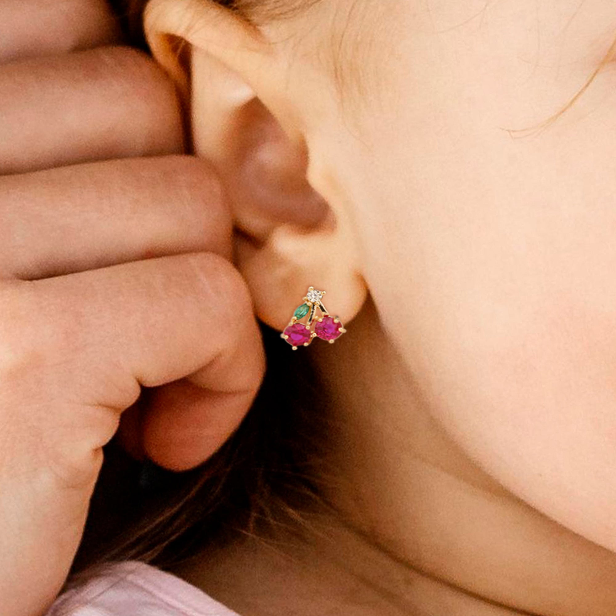 Baby Girl Wearing Crystal Cherry Earrings