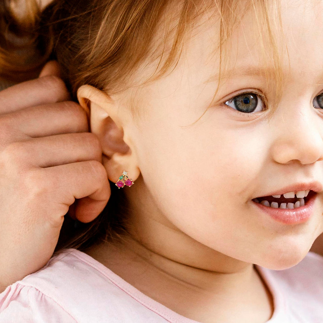 Baby Girl Wearing Crystal Cherry Earrings