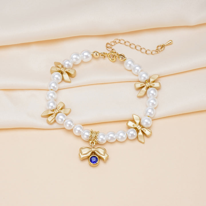 Bracelet à breloques personnalisé avec pierre de naissance et nœud pour fille 